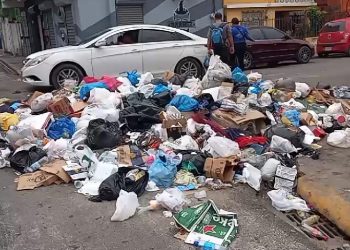 Santiago inicia el 2024 con las calles y las avenidas en mal estado y arropadas de basura