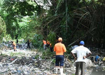 Encuentran cuerpo de menor arrastrada por cañada en Santo Domingo Norte