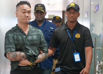 Aplazan medida de coerción contra chino propietario de Mudan acusado de violencia de género