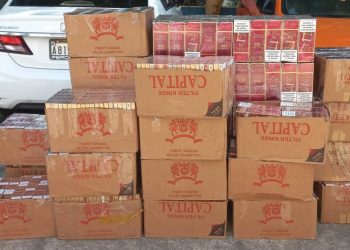 Policía Nacional apresa una mujer en posesión de más de 8,000 cajetillas de cigarrillos